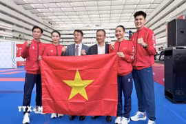 Niềm vui của đội tuyển Karate Việt Nam. (Ảnh: TTXVN phát)