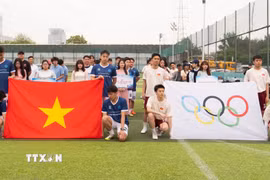 Các bạn lưu học sinh Việt Nam tại Bắc Kinh, Thiên Tân tham dự giải thể thao. (Ảnh: Quang Hưng/TTXVN)