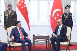 Thường trực Ban Bí thư Trần Cẩm Tú hội kiến Tổng thống Singapore Tharman Shanmugaratnam. (Ảnh: Phương Hoa/TTXVN)
