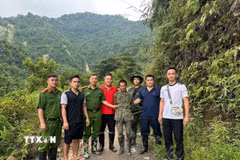 Lực lượng Công an triển khai truy bắt, bắt giữ thành công đối tượng Bùi Văn Nhượng. (Ảnh: TTXVN phát)