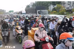 Quốc lộ 1 đoạn qua tỉnh Tây Ninh thường xuyên chịu áp lực giao thông vào các dịp lễ, Tết, khi lượng phương tiện qua tuyến tăng mạnh. (Ảnh: Bùi Giang/TTXVN)