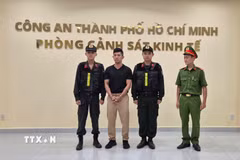 Ca sỹ Lương Bằng Quang tại Cơ quan Công an. (Ảnh: TXVN phát)