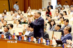 Tổng Bí thư, Chủ tịch nước Tô Lâm và các đại biểu dự hội nghị tại điểm cầu Trung tâm Nhà Quốc hội (Hà Nội). (Ảnh: Thống Nhất/TTXVN)