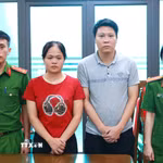 Bị can Lê Thanh Hiển và Đỗ Kim Chung tại Cơ quan cảnh sát điều tra. (Ảnh: TTXVN phát)