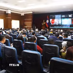 Quang cảnh buổi kết nối tham gia Hội nghị toàn quốc quán triệt các Nghị quyết, Chỉ thị của Bộ Chính trị của cộng đồng người Việt Nam tại Lào. (Ảnh: Xuân Tú/TTXVN)