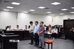 Ba bị cáo tại phiên tòa. (Ảnh: Kim Anh/TTXVN)