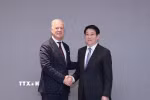 Chủ tịch nước Lương Cường tiếp Tổng Thư ký Phòng Thương mại quốc tế (ICC) John W.H. Denton AO. (Ảnh: Lâm Khánh/TTXVN)