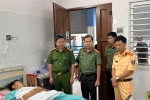 Đại tá Nguyễn Tường Vũ – Phó Giám đốc Công an tỉnh Lâm Đồng - cùng đoàn công tác thăm hỏi Trung tá Nguyễn Hoàng Trung. (Nguồn: Công an tỉnh Lâm Đồng)