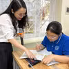 Giờ học của cô và trò Trường Trung học cơ sở Chương Dương. (Ảnh: PM/Vietnam+)