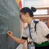 Giờ dạy của giáo viên Trường Trung học cơ sở Pom Lót, tỉnh Điện Biên. (Ảnh: Phạm Mai/Vietnam+)