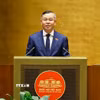 Bộ trưởng Bộ Tài chính Ngô Văn Tuấn, thừa ủy quyền của Thủ tướng Chính phủ trình bày tờ trình về 05 dự án: Luật Ngân sách nhà nước (hợp nhất); Luật Đấu thầu (sửa đổi); Luật sửa đổi, bổ sung một số điều của Luật Đầu tư; Luật sửa đổi, bổ sung một số điều của Luật Thuế thu nhập doanh nghiệp, Luật Thuế sử dụng đất phi nông nghiệp, Luật Thuế thu nhập cá nhân; Luật Trưng mua, trưng dụng tài sản (sửa đổi). (Ảnh: Doãn Tấn/TTXVN)