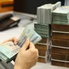 Riêng trong tháng Bảy, tổng thu ngân sách Nhà nước ước đạt 242,1 nghìn tỷ đồng. (Ảnh: Vietnam+)