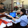 Kho bạc Nhà nước hiện đại hóa quy trình, giảm thủ tục, ứng dụng công nghệ để nâng cao hiệu quả quản lý ngân sách và thanh toán công nhanh chóng. (Ảnh: KBNN/Vietnam+)