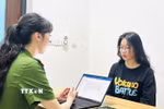 Đối tượng Lê Thị Thanh Hằng tại cơ quan công an. (Ảnh: TTXVN phát)