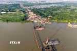 Thi công cầu Trần Hưng Đạo. (Ảnh: Phạm Tuấn Anh/TTXVN)