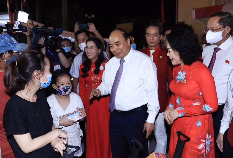 Chủ tịch nước Nguyễn Xuân Phúc và các đại biểu tại Lễ phát động Tháng Nhân đạo năm 2022. (Ảnh: Thống Nhất/TTXVN)