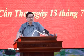 Thủ tướng Phạm Minh Chính chủ trì Hội nghị về thực hiện mô hình chính quyền địa phương 2 cấp và triển khai các dự án trọng điểm vùng Đồng bằng sông Cửu Long. (Ảnh: Dương Giang/TTXVN)