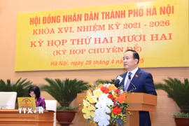 Ông Nguyễn Ngọc Tuấn, Phó Bí thư Thành ủy, Chủ tịch HĐND phát biểu tại kỳ họp. (Ảnh: Quốc Lũy/TTXVN)