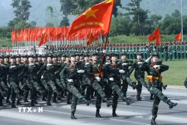 Khối nữ quân y tham gia hợp luyện. (Ảnh: Trọng Đức/TTXVN)