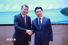 Thủ tướng Lê Minh Hưng và Thủ tướng Lào Saleumxay Kommasith đồng chủ trì Hội nghị Xúc tiến đầu tư Việt Nam-Lào. (Ảnh: Dương Giang/TTXVN)