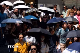 Người dân tại Tokyo, Nhật Bản. (Ảnh minh họa: THX/TTXVN)