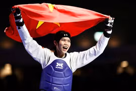 Ánh Tuyết ăn mừng sau khi giành chiến thắng. (Nguồn: Báo Tuổi trẻ)