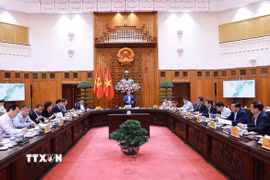 Thủ tướng Phạm Minh Chính chủ trì họp về dự án quy hoạch xây dựng cảnh quan sông Hồng. (Ảnh: Dương Giang/TTXVN)