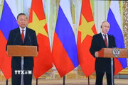 Tổng Bí thư, Chủ tịch nước Tô Lâm và Tổng thống Liên bang Nga Vladimir Putin dự và phát biểu trực tuyến tại điểm cầu nước Nga. (Ảnh: Văn Điệp/TTXVN)