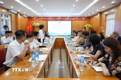 Quang cảnh buổi trao đổi, chia sẻ kinh nghiệm. (Ảnh: Kim Anh/TTXVN)