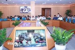 Hội nghị tiếp nhận, tổng hợp ý kiến và trả lời nhân dân về điều chỉnh tổng thể Quy hoạch phân khu đô thị sông Hồng. (Ảnh: Vũ Quang/TTXVN)