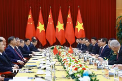 Thủ tướng Phạm Minh Chính hội kiến Tổng Bí thư, Chủ tịch nước Trung Quốc Tập Cận Bình. (Ảnh: Dương Giang/TTXVN)