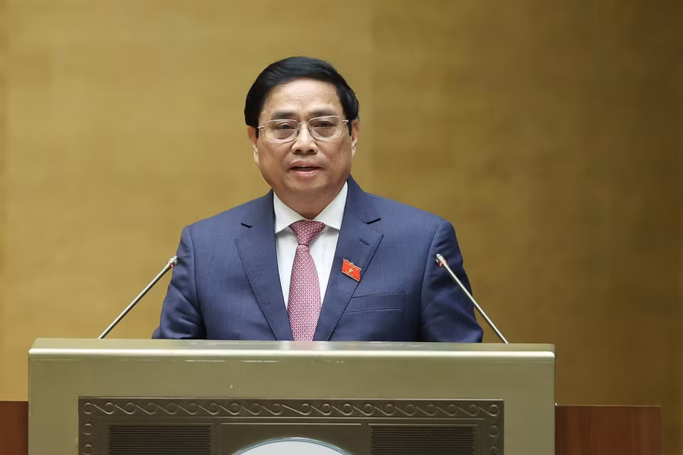 Thủ tướng Phạm Minh Chính trình bày Báo cáo kết quả thực hiện kế hoạch phát triển kinh tế-xã hội năm 2022; dự kiến kế hoạch phát triển kinh tế-xã hội năm 2023. (Ảnh: Dương Giang/TTXVN)