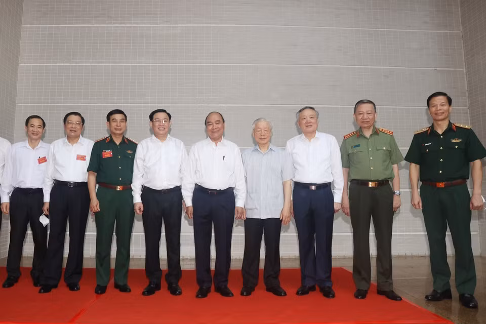Tổng Bí thư Nguyễn Phú Trọng, Chủ tịch nước Nguyễn Xuân Phúc, Chủ tịch Quốc hội Vương Đình Huệ và các lãnh đạo Đảng, Nhà nước dự hội nghị. (Ảnh: Trí Dũng/TTXVN)