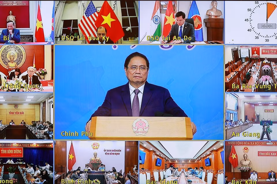 Hội nghị trực tuyến đến các điểm cầu trong và ngoài nước. (Ảnh: Dương Giang/TTXVN)