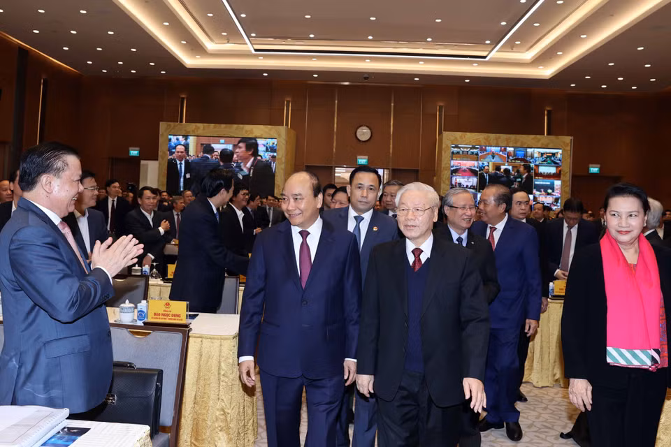Tổng Bí thư, Chủ tịch nước Nguyễn Phú Trọng, Thủ tướng Nguyễn Xuân Phúc, Thủ tướng Nguyễn Xuân Phúc, Chủ tịch Quốc hội Nguyễn Thị Kim Ngân và các đại biểu đến dự tại điểm cầu Hà Nội. (Ảnh: Thống Nhất/TTXVN)