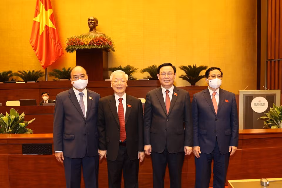 Tổng Bí thư Nguyễn Phú Trọng, Chủ tịch nước Nguyễn Xuân Phúc, Chủ tịch Quốc hội Vương Đình Huệ, Thủ tướng Phạm Minh Chính tại Lẽ khai mạc. (Ảnh: Trí Dũng/TTXVN)