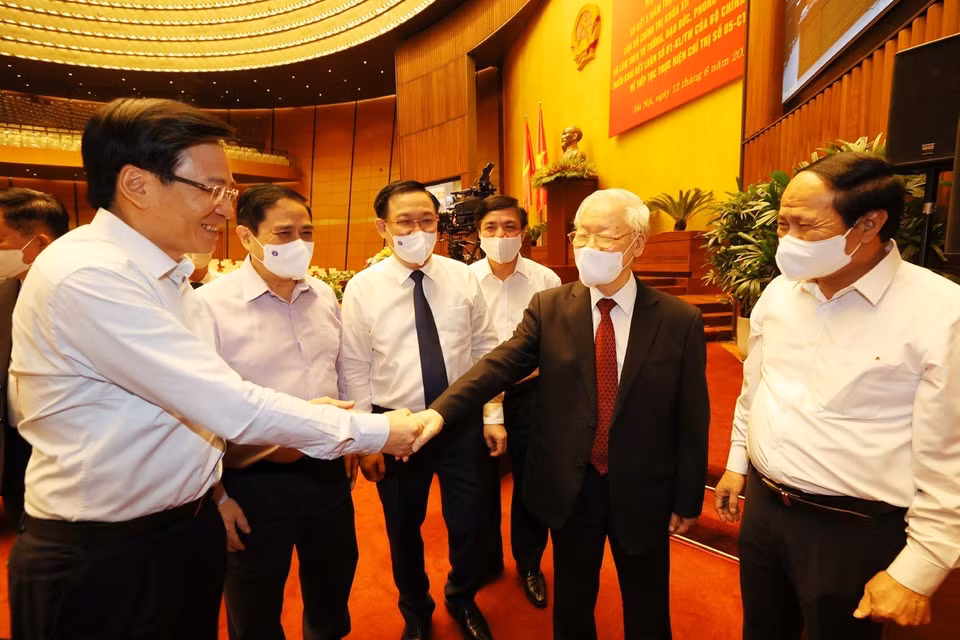 Tổng Bí thư Nguyễn Phú Trọng, Thủ tướng Phạm Minh Chính, Chủ tịch Quốc hội Vương Đình Huệ và các đại biểu dự hội nghị. (Ảnh: Trí Dũng/TTXVN)