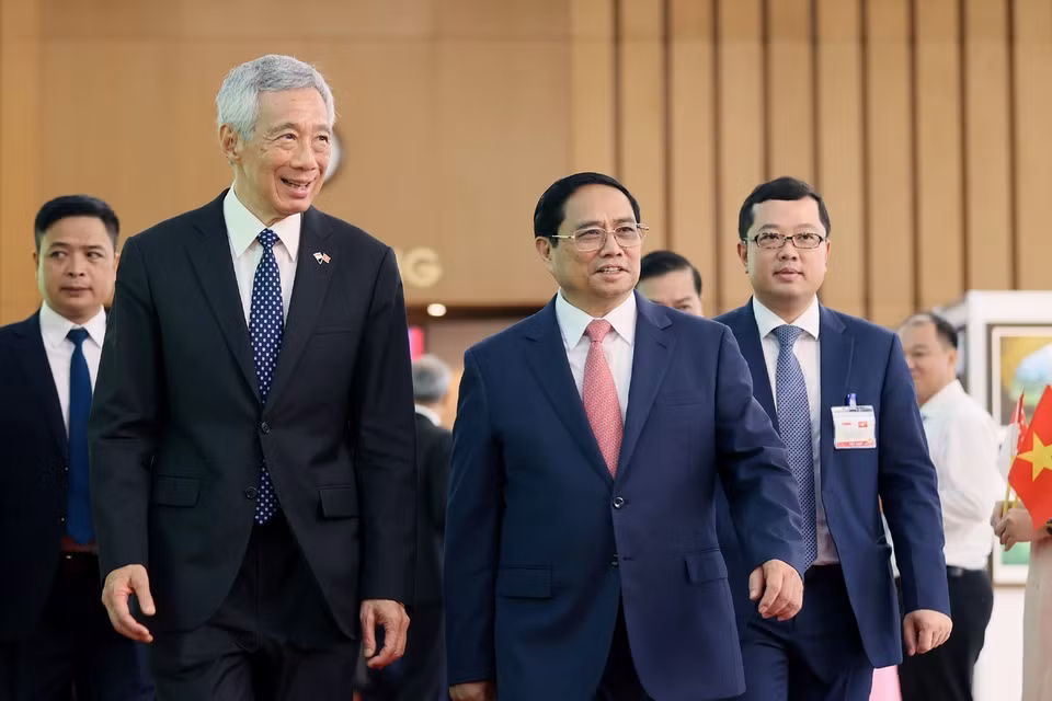 Thủ tướng Phạm Minh Chính và Thủ tướng nước Cộng hòa Singapore Lý Hiển Long. (Ảnh: Dương Giang/TTXVN)