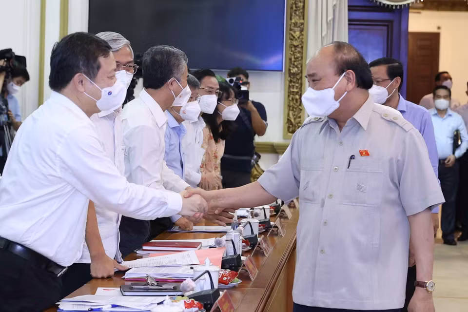 Chủ tịch nước Nguyễn Xuân Phúc với các đại biểu dự hội nghị. (Ảnh: Thống Nhất/TTXVN)