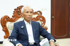 Đồng chí Khamphan Pheuiyavong, Ủy viên Bộ Chính trị, Trưởng ban Tuyên huấn Trung ương Đảng Nhân dân cách mạng Lào, trả lời phỏng vấn. (Ảnh: Xuân Tú/TTXVN)