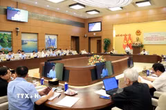 Phó Chủ tịch Quốc hội Nguyễn Hồng Diên chủ trì hội thảo. (Ảnh: Tuấn Anh/TTXVN)