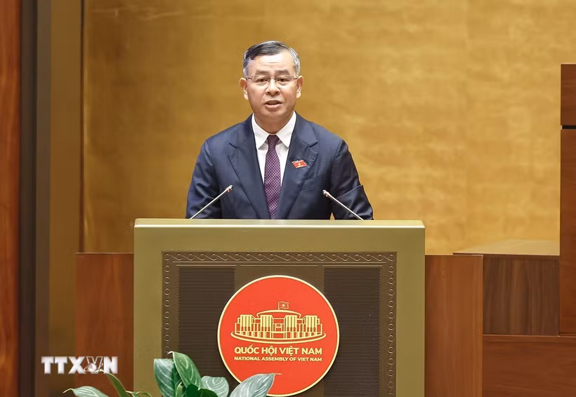 Bộ trưởng Bộ Tài chính Ngô Văn Tuấn giải trình ý kiến ĐBQH về dự án Luật sửa đổi, bổ sung một số điều của Luật Chứng khoán. (Ảnh: TTXVN)