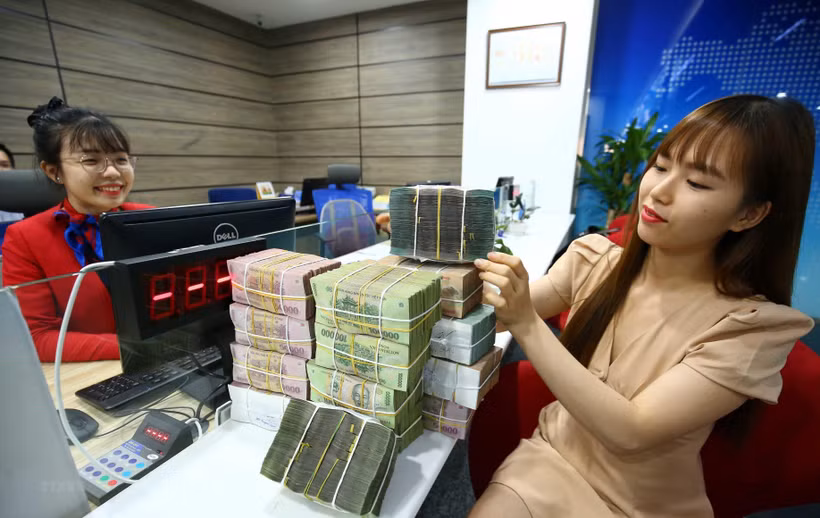 Ngân hàng tăng vốn nhằm củng cố bộ đệm, tiếp sức cho nền kinh tế. (Ảnh: Vietnam+)