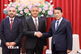 Bộ trưởng Bộ Công an Lương Tam Quang tiếp Phó Chủ tịch Hội đồng quản trị, Đồng sáng lập Tập đoàn ICT Murat Kaya và Chủ tịch Tập đoàn ANVI Adalat Bakhisov của Thổ Nhĩ Kỳ. (Ảnh: Phạm Kiên/TTXVN)