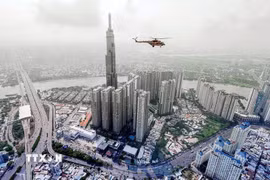 Việt Nam luôn nằm trong top những quốc gia có nền kinh tế tăng trưởng cao. Trong ảnh: Thành phố Hồ Chí Minh là trung tâm tài chính lớn nhất và là đầu tàu kinh tế quan trọng nhất của cả nước. (Ảnh: Thanh Vũ/TTXVN)
