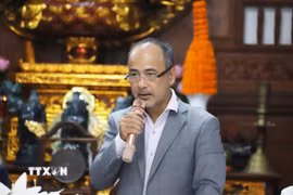 Chủ nhiệm Ủy ban Nhà nước về người Việt Nam ở nước ngoài Nguyễn Trung Kiên phát biểu tại buổi làm việc. (Ảnh: Xuân Tú/TTXVN)