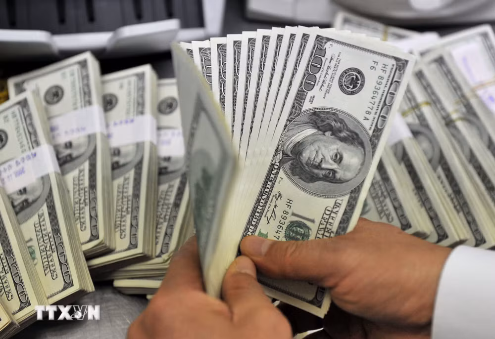 ttxvn-dong-usd-thap-nhat-trong-15-thang-6832436.jpg