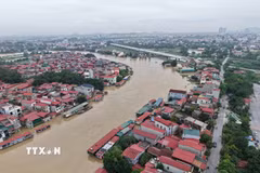 Nước sông Cầu dâng cao ngập nhà dân gần 2m, ngày 25/8/2026. (Ảnh: Thanh Thương/TTXVN)