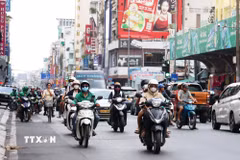 Tài xế công nghệ tại thành phố Hồ Chí Minh. (Ảnh: Hồng Đạt/TTXVN)