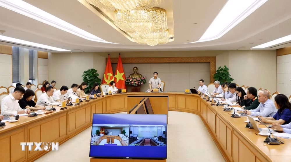 ttxvn_pho-thu-tuong-nguyen-van-thang-chu-tri-phien-hop-thu-tu-cua-hoi-dong-dieu-hanh-trung-tam-tai-chinh-quoc-te-7431.jpg